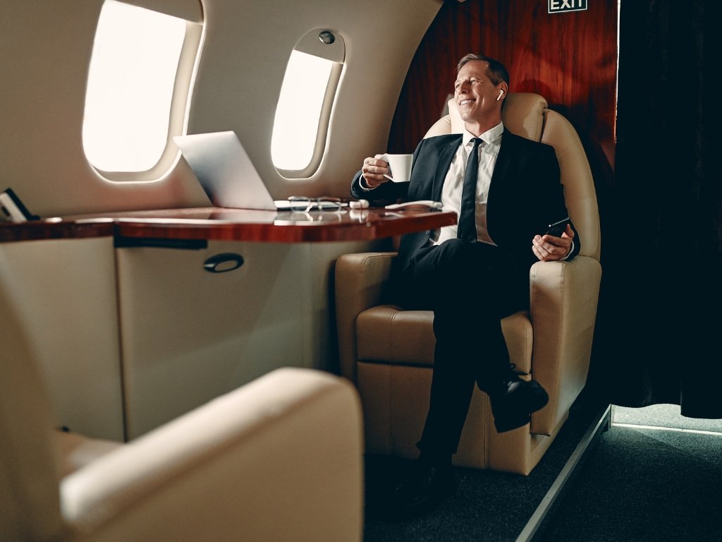 A man travelling aboard a luxury private jet in Rio de Janeiro, Brazil.