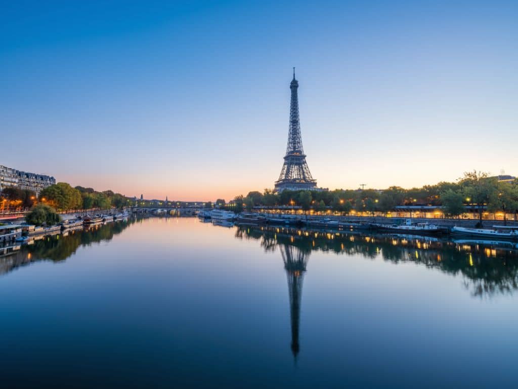 Parisian charm and beauty showcased through the illuminating Eiffel Tower, an unforgettable sight