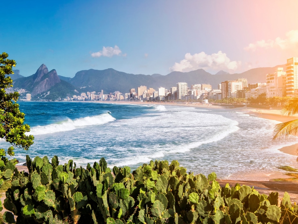 The vibrant cityscape of rio de janeiro with its iconic landmarks like the christ the redeemer statue and sugarloaf mountain