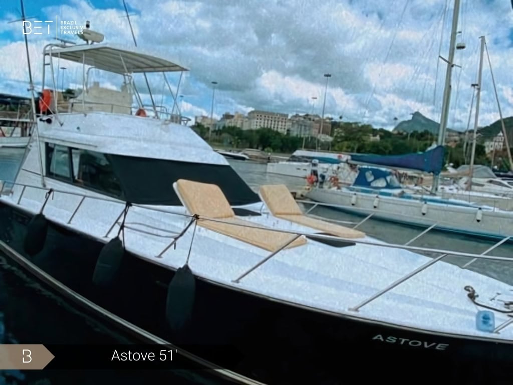 Astove 51 yacht rental in Rio de Janeiro cruising on clear blue waters.