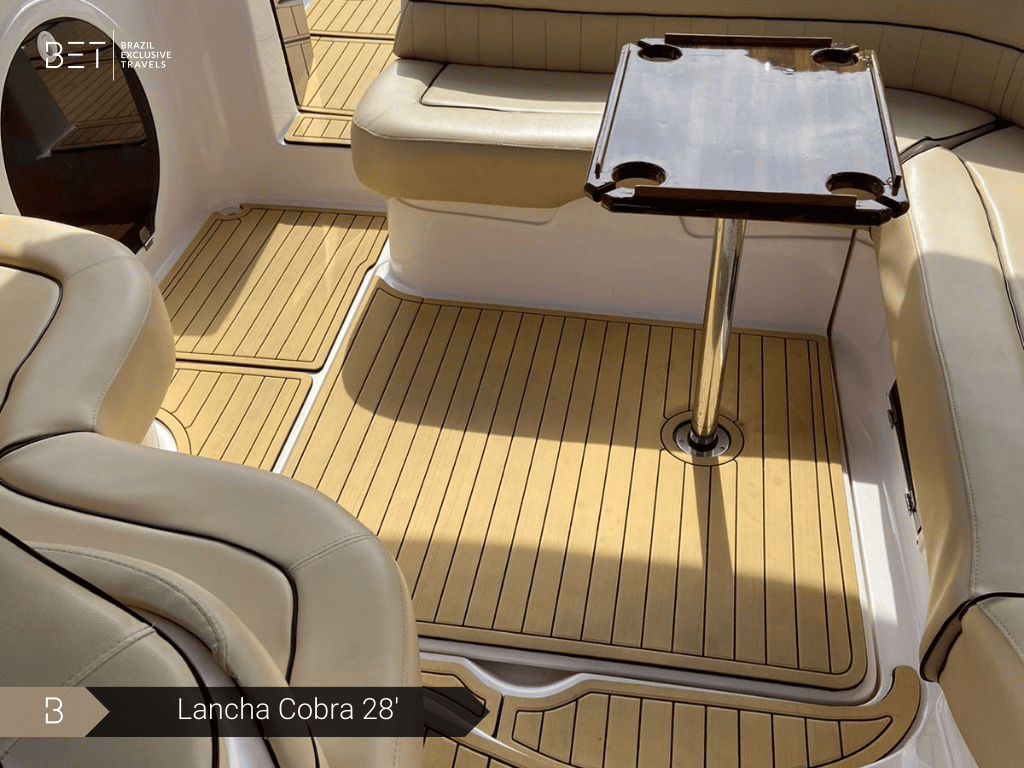 Lancha Cobra 28 yacht rental in Rio, perfect for thrilling coastal rides.