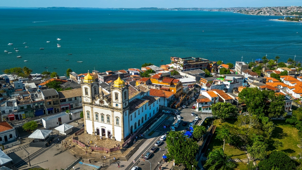 Aerial view of Salvador de Bahia showcasing its historic coastline, colonial architecture, and Atlantic Ocean backdrop