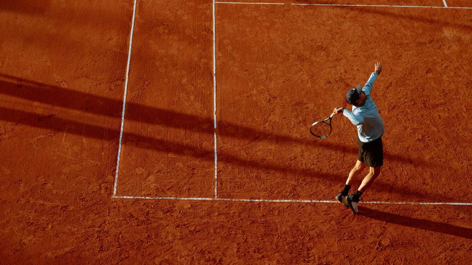 20 Professional tennis player competing on a clay court during a match at the Rio Open
