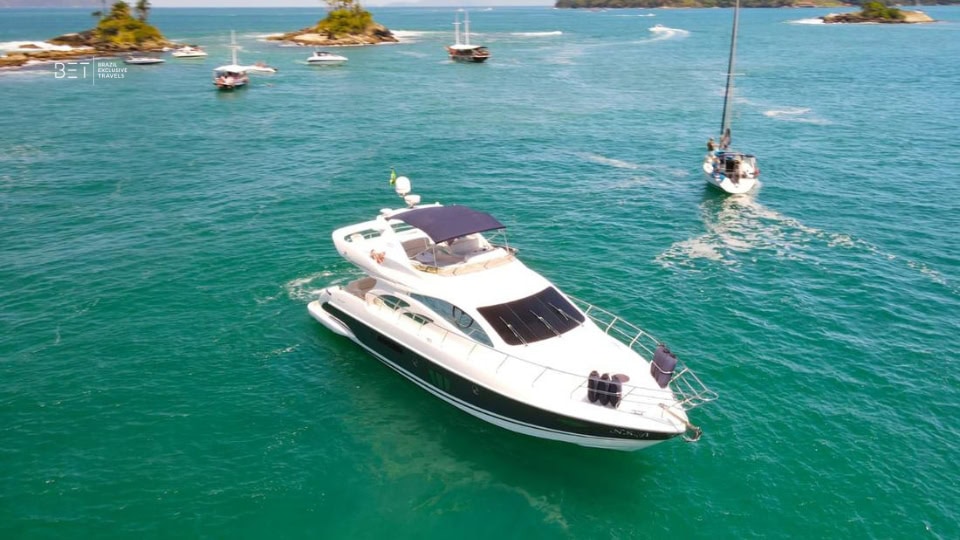 Azimut 60 luxury yacht available for rental in Angra's stunning coastline.