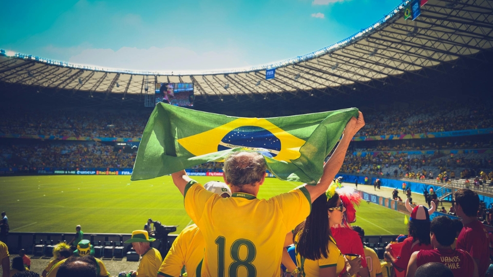 Blog Pictures - NEW (2) Brazilian football fan inside a stadium during a World Cup game.