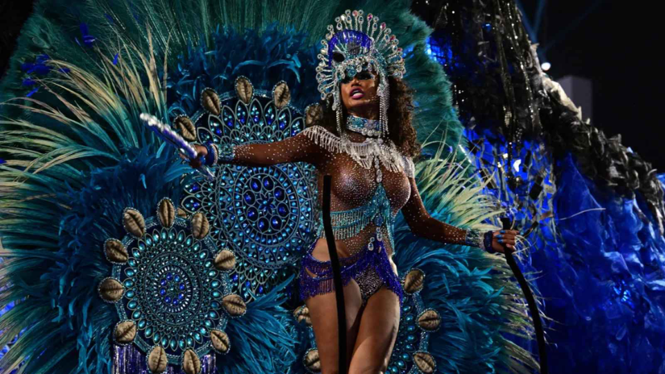 rio carnival camarote blue woman 960-540 Samba school dancer at a Carnival Parade viewed from Nosso Camarote
