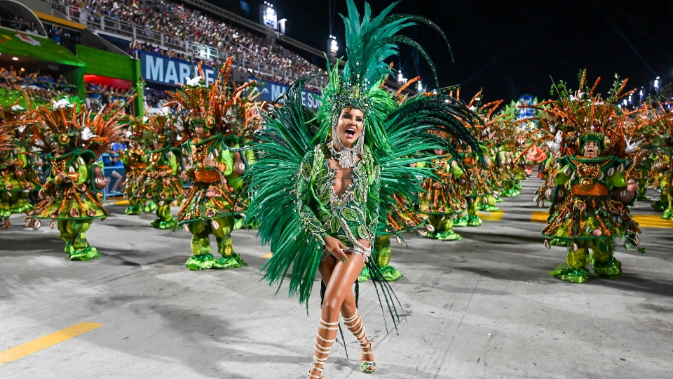 Samba dancer performing at the Sambadrome during Carnival in Rio de Janeiro, showcasing the artistry and scale of the parade