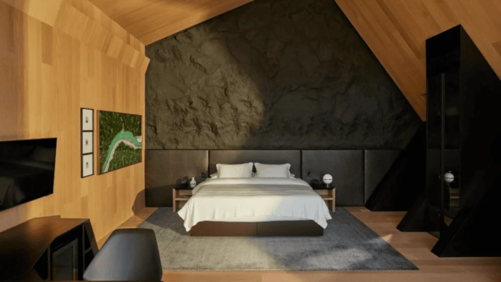 Unique Garden - Hotel Booking in Sao Paulo (10) Modern bedroom with wooden walls, black accent wall, and minimalist decor in a hotel.